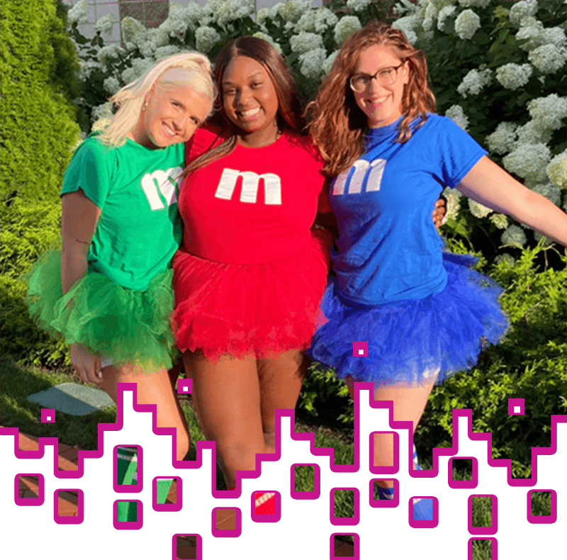 Women in M&M costumes