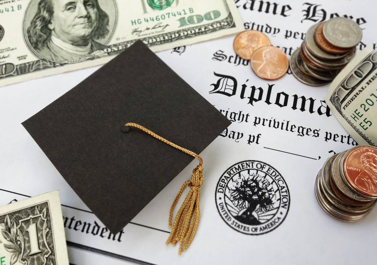 Graduation cap on diploma